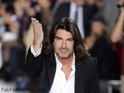 French designer Rolland appears at the end of his Haute Couture Spring-Summer 2012 fashion show in Paris