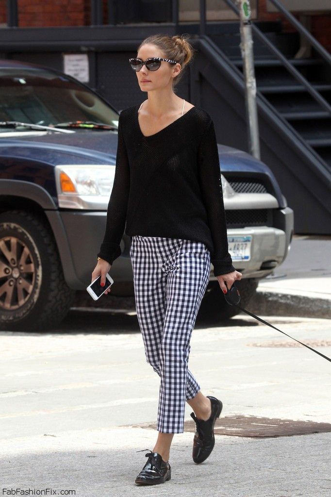 Olivia Palermo goes casual in a loose black sweater and checkered pants while walking her dog in New York City. Jun 11, 2013