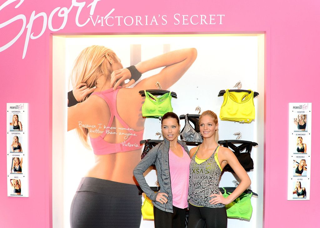 15 JANUARY 2013 - New York - Victoria's Secret Angels Adriana Lima (L) and  Erin Heatherton attend the Victoria's Secret VSX Launch Event at Victoria's  Secret Herald Square flagship store on January